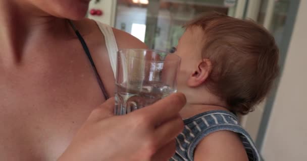 Mother Offering Glass Water Baby — Stock video