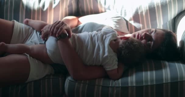 Parent Sleeping Baby Child Sofa Candid Casual Mother Asleep Infant — стоковое видео