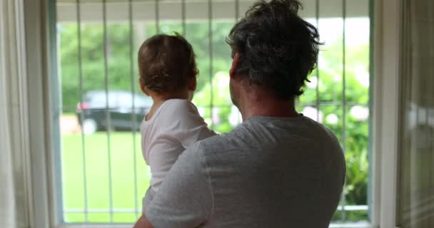 Grandfather Holding Baby Grandson Next Home Window Rainy Day Rain — Stock videók