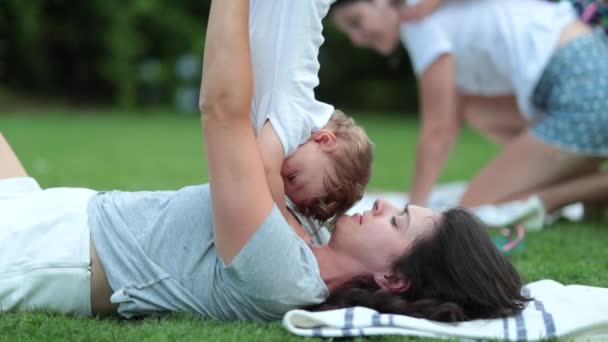 Playful Mother Lifting Baby Toddler Upside — Stock Video