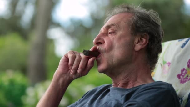 Senior Man Smoking Cigar Enjoying Retirement — Video Stock