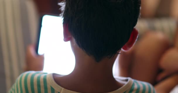 Back Child Head Staring Screen Device Night — Vídeo de stock