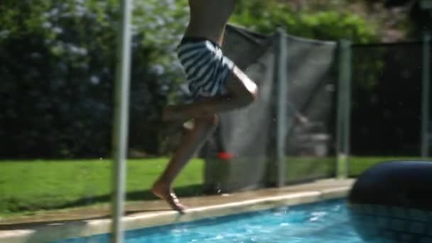 Young Boy Running Jumping Swimming Pool Water Slow Motion Kid — Stockvideo