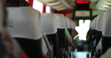 Back of bus perspective, passenger POV traveling by BUS on road trip. traveling by bus point of view