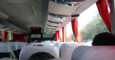 Passenger BUS POV from the back of bus traveling