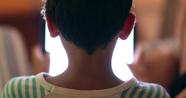 Child Staring Tablet Device Screen Night Back Boy Browsing Internet — Vídeo de stock