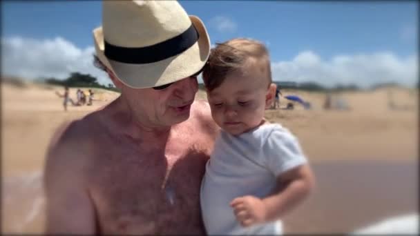 Grandfather Holding Baby Infant Beach Grandpa Grandson Bonding — Stok video