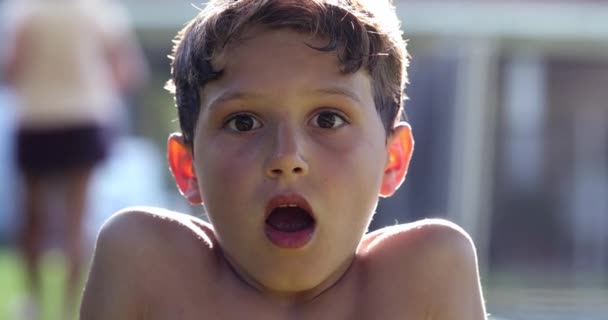 Boy Reacting Shock News Mouth Open Child Looking Camera Disbelief — Video Stock