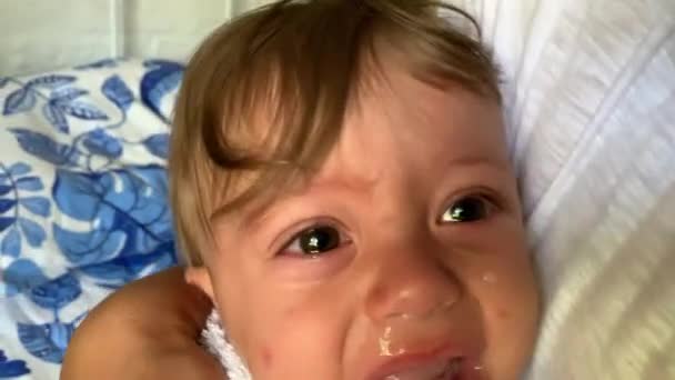 Parent Removing Baby Mucus Salt Water — Stock Video