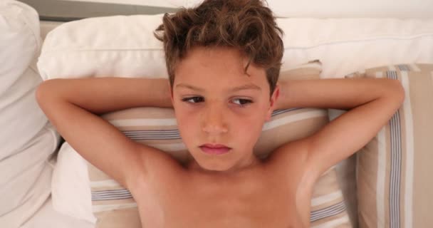 Pensive Child Thinking Bored Young Boy Face Lying Couch — Stock Video