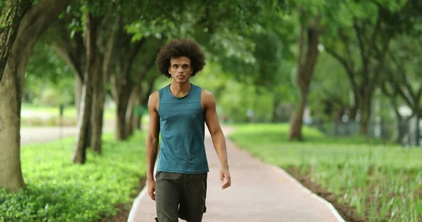 African Man Walking Green Park Path Surrounded Nature — Foto Stock