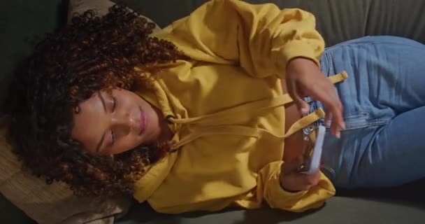 Relaxed African American Girl Lying Couch Using Phone One Black — Stock Video