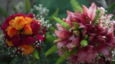 Closeup two colorful beautiful bouquet of flower arrangements made at Flower Shop by professional for valentines
