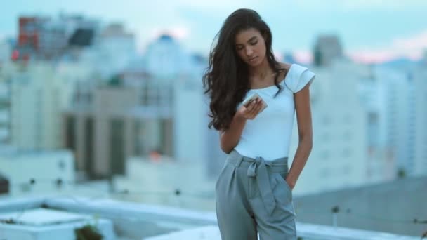 Beautiful Elegant Mixed Race Girl Holding Smartphone City Background — Stock Video