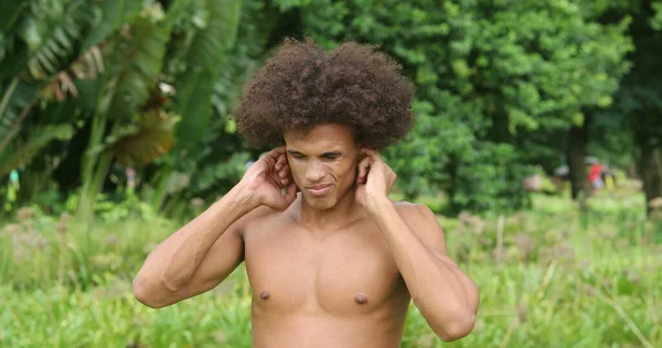 Young African Man Cleaning Ears Casual Candid — Fotografia de Stock