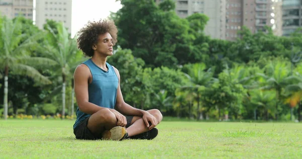 Young African Black Man Seated Grass Meditation Contemplation — Fotografia de Stock