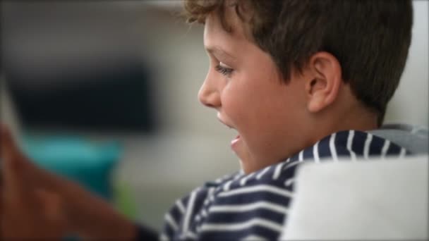 Happy Young Boy Holding Tablet Device — Stock Video