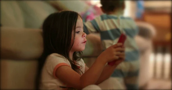 Little Girl Using Smartphone Night Child Staring Cellphone Screen Evening — Foto Stock