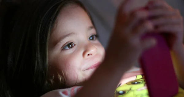 Little Girl Child Using Smartphone Device Light Glowing Girl Face — Stock Fotó