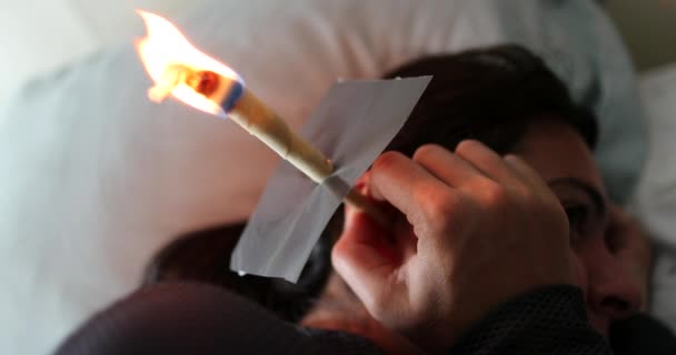 Ear Candling Self Treatment Burning Candle Ear Wax Removal — Stock Video