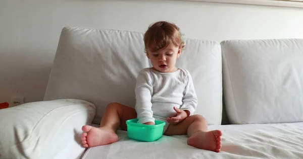 Calm Cute Baby Sitting Couch Eating Snack — 스톡 사진
