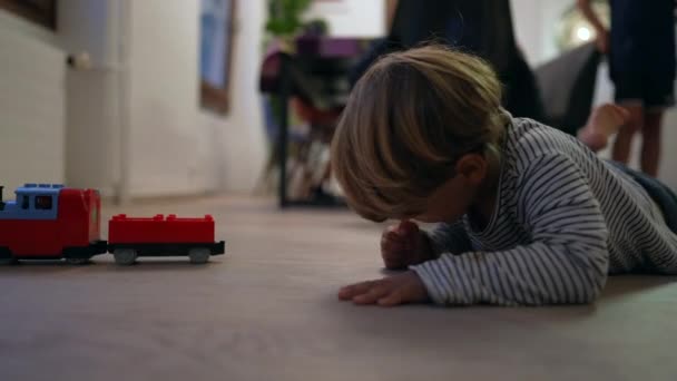 Child Playing Toy Hardwood Floor Kid Plays Home — Stock videók