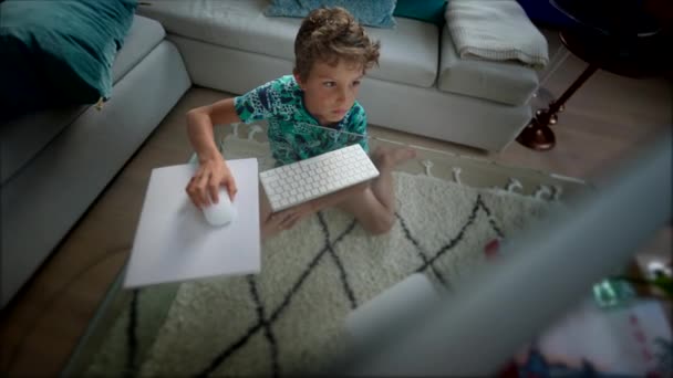 Little Boy Looking Computer Screen Morning Browsing Internet — Stock Video