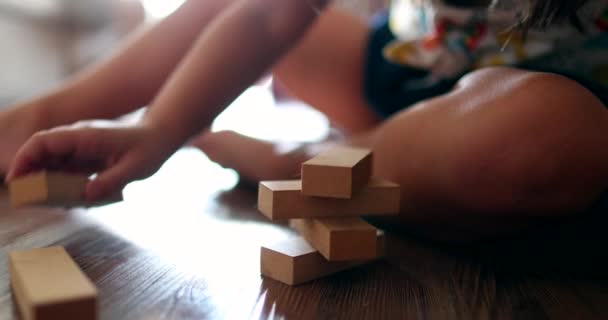 Child Playing Wooden Building Blocks — Stock Video