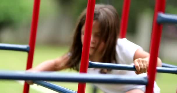 Girl Climbing Monkey Bar Active Little Child Plays Playground — Stock Video