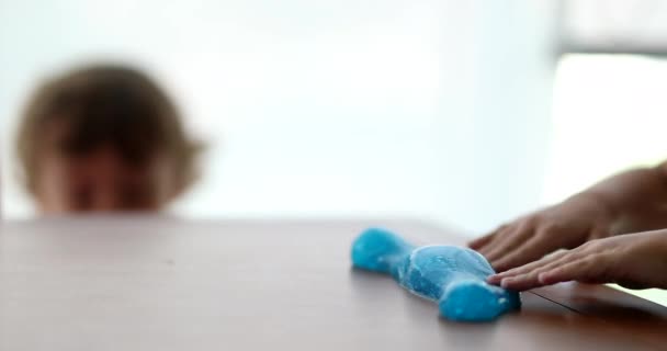 Close Child Hands Playing Blue Plasticine Goo — Stockvideo