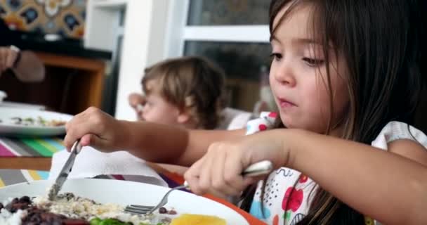 Little Girl Eating Lunch Meal Table — Vídeos de Stock