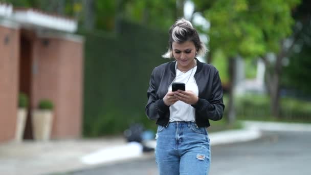 Happy Woman Staring Phone Screen While Walking — Stock Video