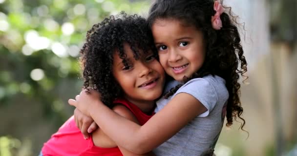 Hispanic Siblings Embrace Hug Two Sisters Love — Stock Video