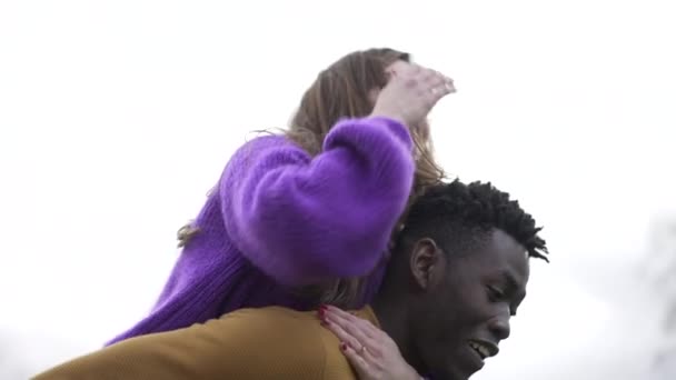 Happy Millennial Couple Together Black Boyfriend Carrying Girlfriend Back — Stock Video