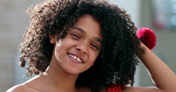 Happy diverse child girl portrait face close-up smiling