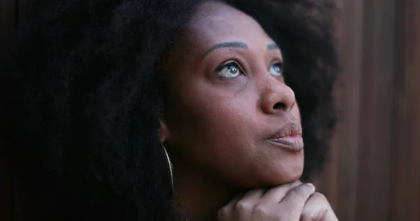 Worried black African woman close-up face