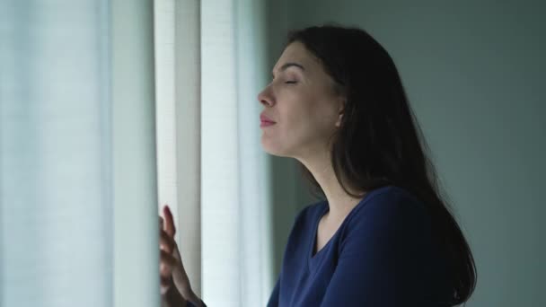 Anxious Woman Standing Window Peeking Out Suspicion Feeling Distrust — Stock Video