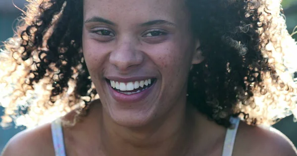 Happy hispanic woman laughing. Real life laugh and smile, Brazilian ethnicity