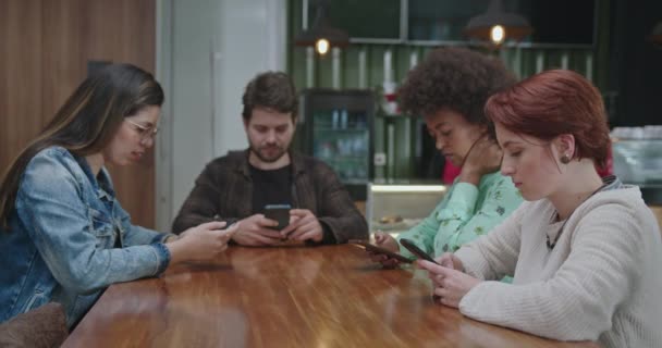 Group Friends Sitting Coffee Shop Table Smartphones Happy Male Female — Stock Video