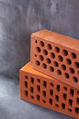 Soyut çimento arkaplan dokusunda inşaat tuğlası. İnşaat fikri kavramı