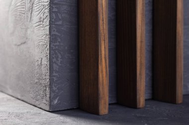 Concrete cube at abstract cement background texture. Wall corner of house