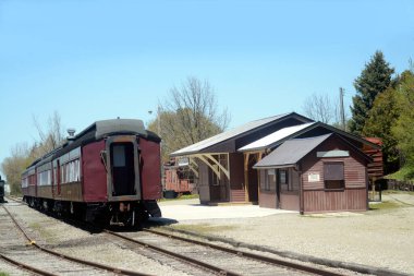 Vintage rail car and train station