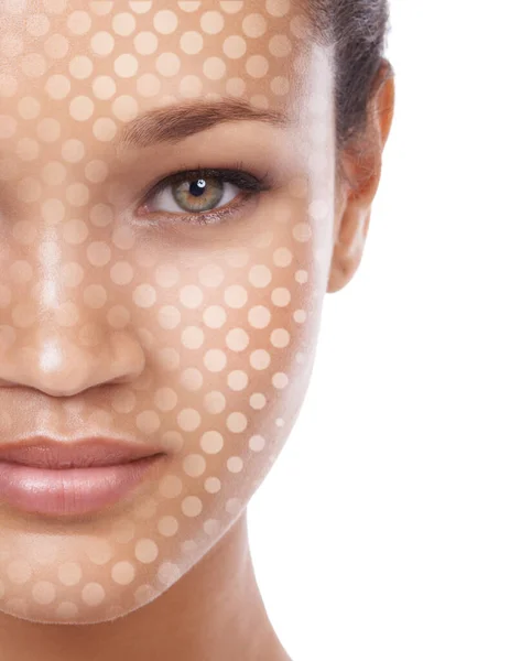 Beauty one dot at a time. Conceptual studio portrait of a young ethnic woman with a dot matrix overlay on her face. — Stock Photo, Image