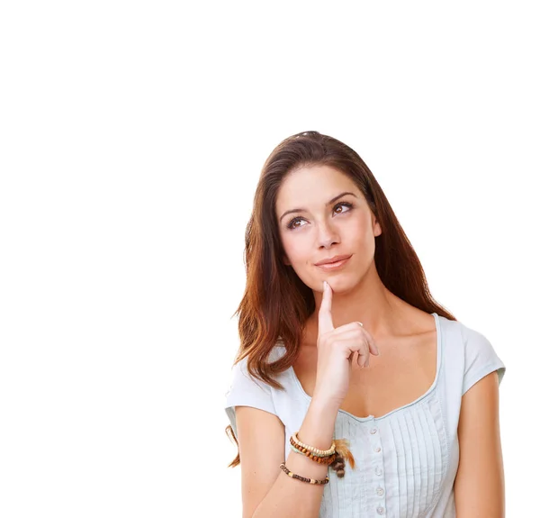 I know just what to do.... A young woman thinking against a white background. — Stock Photo, Image