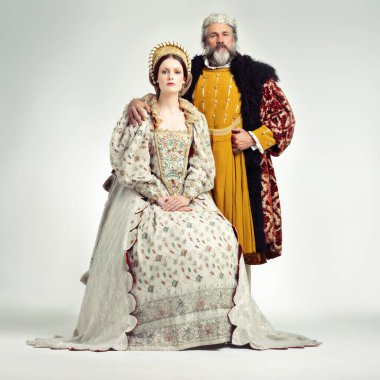 The Royals. Studio shot of a regal king and queen. clipart