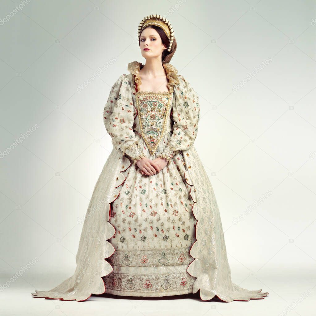 Shes the quintessential sovereign. Studio shot of beautiful young queen.