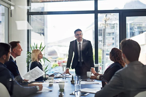 Ironing out the details. Shot of corporate businesspeople meeting in the boardroom.