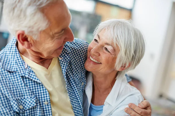 True love really do last forever. Cropped shot of a loving senior couple at home. — Stock Photo, Image