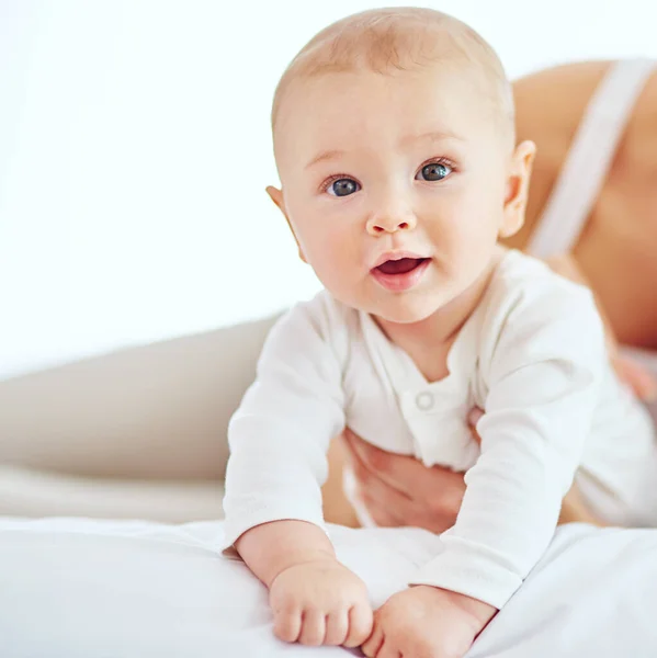 Hanging out with Mom. Shot of an adorable baby boy bonding with his mother at home. — Stock Photo, Image