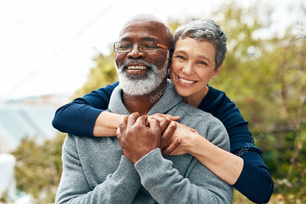 Our love got stronger over the years. Shot of a happy senior couple enjoying quality time at the park.